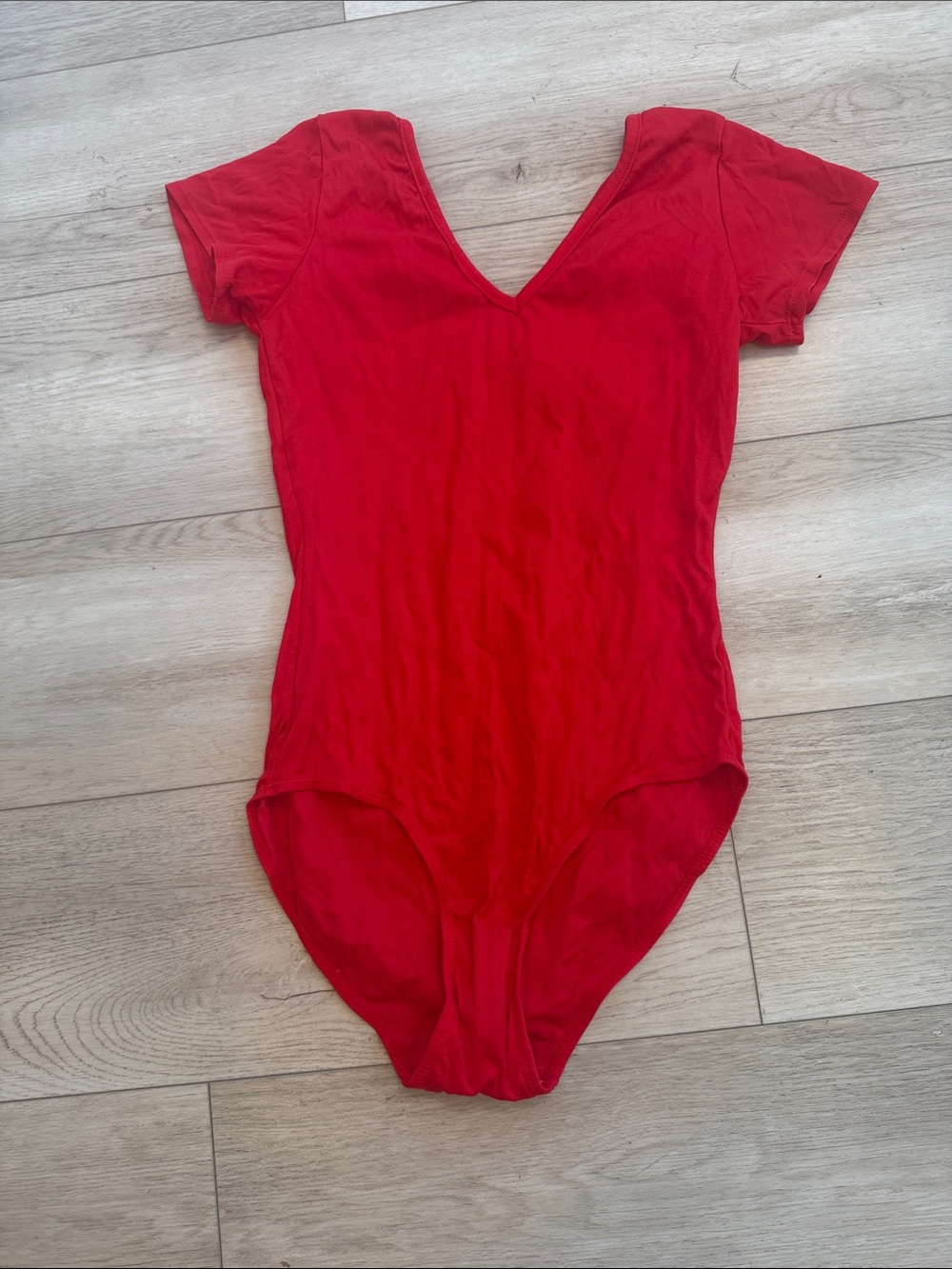 Red woman’s Short Sleeve V-Neck body suit